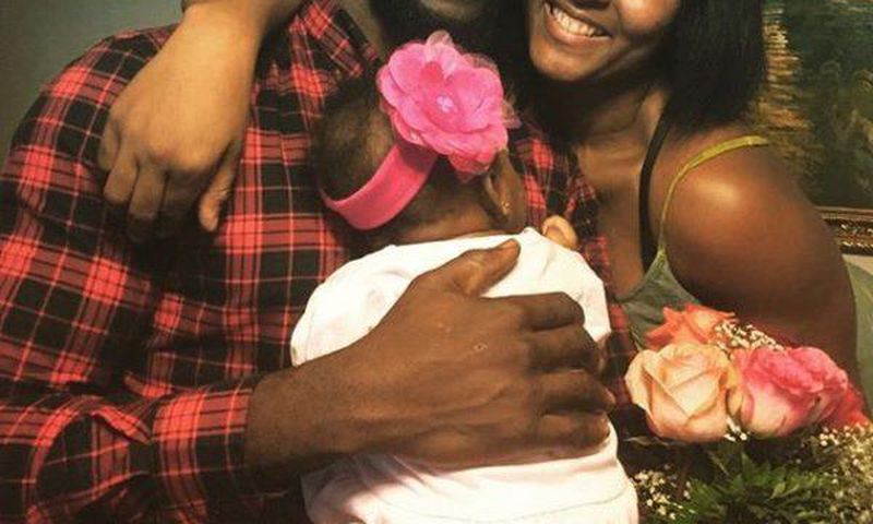 Gbenro, Osas Ajibade with their daughter