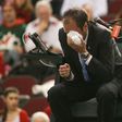 Chair umpire Arnaud Gabas reacts to getting hit in the eye with a ball hit by Denis Shapovalov of Canada on February 5, 2017