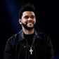 Canadian singer/songwriter The Abel Tesfaye a.k.a The Weeknd performs during the 2016 Victoria's Secret Fashion Show at the Grand Palais in Paris on November 30, 2016