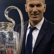 Real Madrid's coach Zinedine Zidane lifts the trophy after Real Madrid won the UEFA Champions League final on June 3, 2017