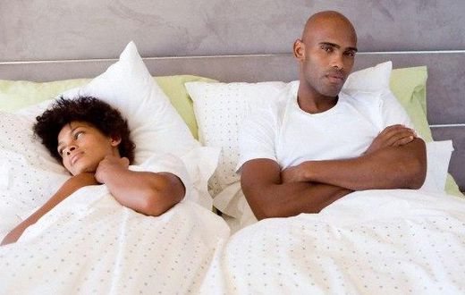 African couple in bed