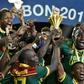 Cameroon's players celebrate with the winner's trophy after defeating Egypt 2-1 to win the 2017 Africa Cup of Nations, at the Stade de l'Amitie Sino-Gabonaise in Libreville, on February 5