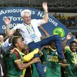 Cameroon players lift Cameroon's Belgian coach Hugo Broos as the celebrate after beating Egypt 2-1 to win the 2017 Africa Cup of Nations final football match between Egypt and Cameroon on February 5, 2017