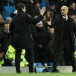 Tottenham Hotspur's head coach Mauricio Pochettino (L) shakes hands with Manchester City's manager Pep Guardiola on January 21, 2017