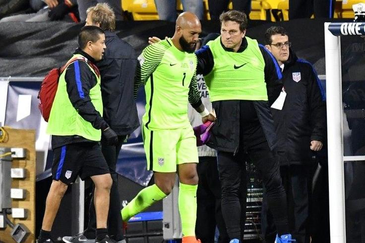 US goalkeeper Tim Howard is helped off of the field after being injured in the first half against Mexico during the FIFA 2018 World Cup Qualifier at MAPFRE Stadium on November 11, 2016 in Columbus, Ohio