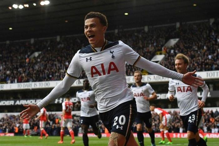 Tottenham Hotspur's midfielder Dele Alli celebrates scoring the opening goal during the English Premier League football match against Arsenal April 30, 2017