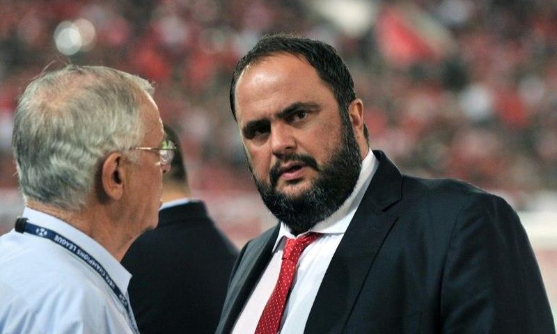 Olympiakos have won seven league titles since Greek shipping magnate Evangelos Marinakis (R) became the team's owner in 2010