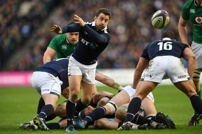Scotland scrum-half Greig Laidlaw passes the ball during the Six Nations match against Ireland at Murrayfield in Edinburgh on Febuary 4, 2017