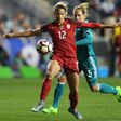 Lynn Williams of the United States knocks the ball away from Babett Peter of Germany during the SheBelieves Cup at Talen Energy Stadium in Chester, Pennsylvania, on March 1, 2017