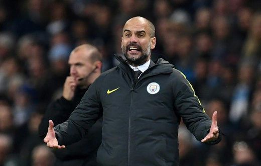 Manchester City's Spanish manager Pep Guardiola gestures on the touchline during the English Premier League football match between Manchester City and Arsenal at the Etihad Stadium in Manchester, north west England, on December 18, 2016