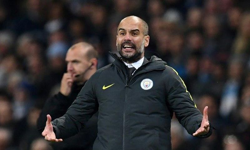 Manchester City's Spanish manager Pep Guardiola gestures on the touchline during the English Premier League football match between Manchester City and Arsenal at the Etihad Stadium in Manchester, north west England, on December 18, 2016