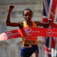 Kenya's Jemima Sumgong crosses the finish line to win the 2016 London Marathon