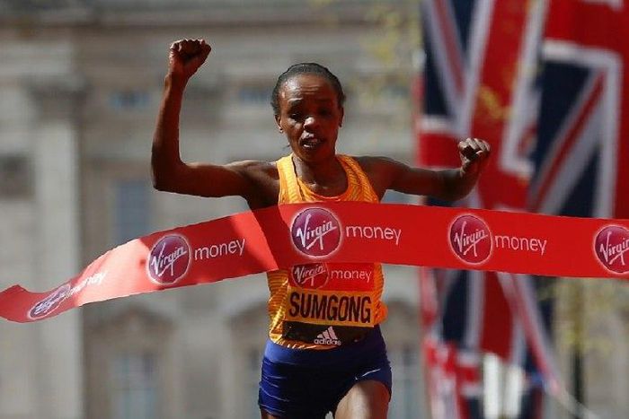 Kenya's Jemima Sumgong crosses the finish line to win the 2016 London Marathon