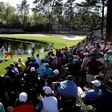 Rory McIlroy and Matt Kuchar walk to the 15th green during the third round of the 2017 Masters tournament, at Augusta National Golf Club in Georgia, on April 8
