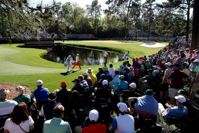 Rory McIlroy and Matt Kuchar walk to the 15th green during the third round of the 2017 Masters tournament, at Augusta National Golf Club in Georgia, on April 8