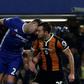 Chelsea defender Gary Cahill (left) and Hull City midfielder Ryan Mason clash heads during the English Premier League match at Stamford Bridge in London on January 22, 2017