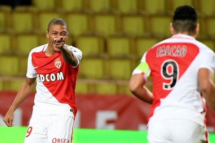 Monaco's Kylian Mbappe Lottin celebrates after scoring a goal during their French Ligue 1 match against Metz at the Louis II Stadium in Monaco on February 11, 2017