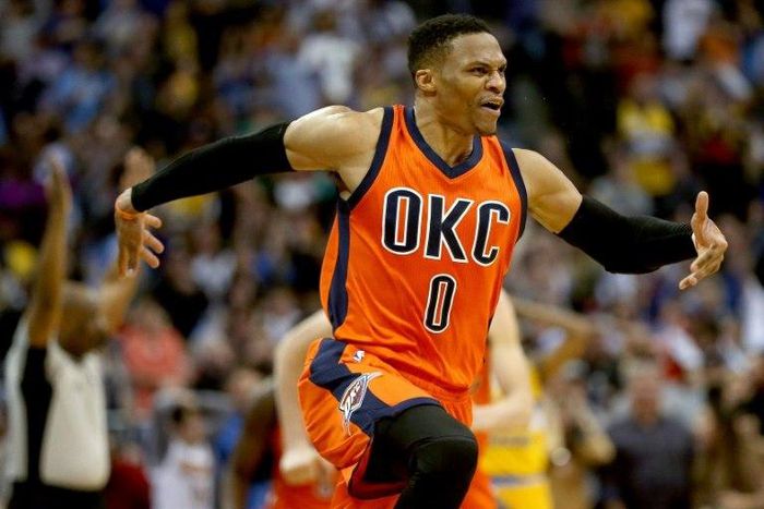 Russell Westbrook of the Oklahoma City Thunder celebrates after scoring his game-winning three-pointer against the Denver Nuggets, at Pepsi Center in Denver, Colorado, on April 9, 2017