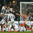 West Bromwich Albion's defender Gareth McAuley (4th L) jumps to head their late equalizer during their match against West Ham United at The London Stadium, in east London on February 11, 2017