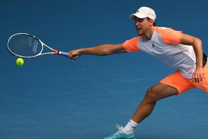 Austria's Dominic Thiem hits a return against Belgium's David Goffin during their men's singles fourth round match on day eight of the Australian Open tennis tournament in Melbourne on January 23, 2017