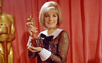 Pop star plays a performer and wins an Oscar? It's happened before