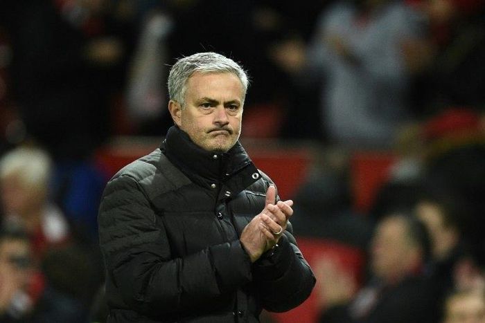 Manchester United's manager Jose Mourinho applauds after the English Premier League football match on December 11, 2016