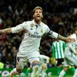 Real Madrid's defender Sergio Ramos celebrates after scoring a goal during the Spanish league footbal match Real Madrid CF vs Real Betis at the Santiago Bernabeu stadium in Madrid on March 12, 2017