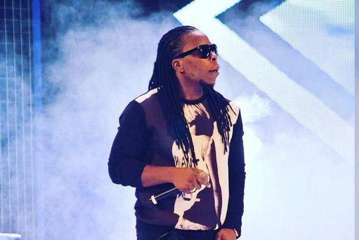 Edem performing on stage