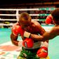 Raphael Kwabena (in green shorts) and Olaide Fijabi (in black and white shorts) slugging it out in the ring on October 2, 2016
