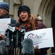 Patricia Gallagher Marchant (R), a victim of clergy abuse, speaks outside the Archdiocese of Chicago