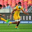 Argentina's Jaguares fly-half Joaquin Diaz Bonilla (L) kicks the ball during the Super XV rugby match between South African Southern Kings and Argentina’s Jaguares at the Nelson Mandela Nay rugby stadium on February 25, 2017 in Port Elizabeth