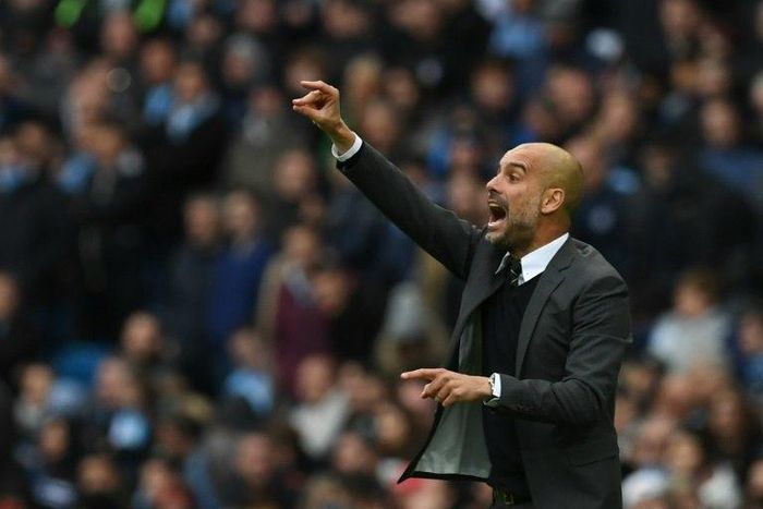 Manchester City's manager Pep Guardiola yells on the touchline on October 23, 2016