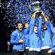 (R-L) Argentina's coach Daniel Orsanic, Juan martin del Potro, Guido Pella, Federico Delbonis and Leonardo Mayer celebrate with the trophy after winning the Davis Cup World Group final between Croatia and Argentina on November 27, 2016