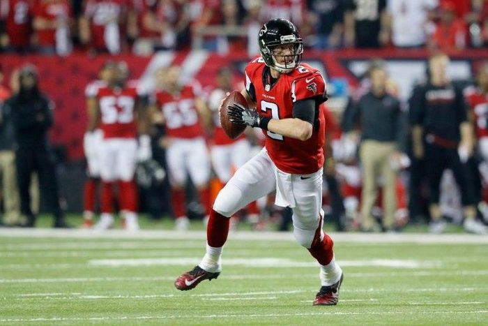 Matt Ryan of the Atlanta Falcons runs the ball against the Seattle Seahawks at the Georgia Dome on January 14, 2017 in Atlanta, Georgia