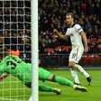Tottenham Hotspur's striker Harry Kane (R) scores past CSKA Moscow's goalkeeper Igor Akinfeev as Spurs take a 2-1 lead during the UEFA Champions League group E football match between Tottenham Hotspur and CSKA Moscow on December 7, 2016
