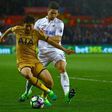 Tottenham Hotspur's striker Son Heung-Min (L) vies with Swansea City's defender Federico Fernandez during the English Premier League football match between Swansea City and Tottenham Hotspur at The Liberty Stadium on April 5, 2017