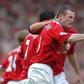 Manchester United's Wayne Rooney celebrates after scoring to make it 1-1 against Newcastle during a Premiereship match at Old Trafford on April 24, 2005