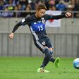 Japan's Hiroshi Kiyotake puts Japan ahead from the penalty spot in their World Cup qualifier against Saudi Arabia in Saitama on November 15, 2016