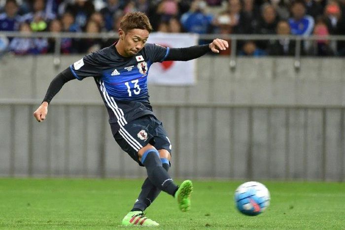 Japan's Hiroshi Kiyotake puts Japan ahead from the penalty spot in their World Cup qualifier against Saudi Arabia in Saitama on November 15, 2016