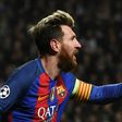Barcelona's Argentinian striker Lionel Messi celebrates scoring the opening goal against Celtic in Glasgow on November 23, 2016