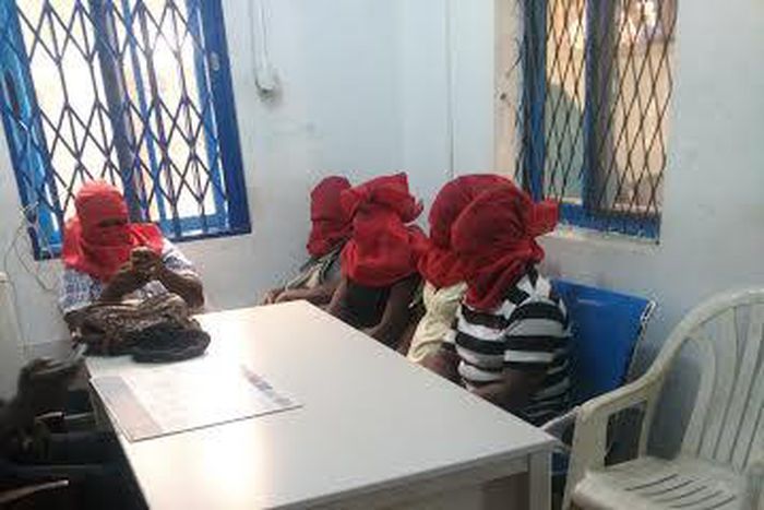 During the identification process the faces of the female teachers were covered with red cloth, to protect them from future attacks.