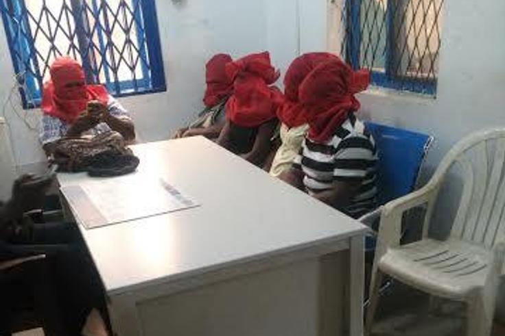 During the identification process the faces of the female teachers were covered with red cloth, to protect them from future attacks.