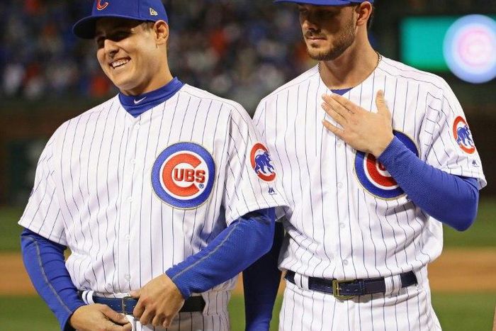 Anthony Rizzo (L) and Kris Bryant of the Chicago Cubs, seen during player introductions ahead of their home opening game against the Los Angeles Dodgers, at Wrigley Field in Chicago, Illinois, on April 10, 2017