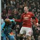 Wayne Rooney (right) celebrates after equalling Bobby Charlton's Manchester United all-time scoring record during the English FA Cup third round match against Reading at Old Trafford on January 7, 2017