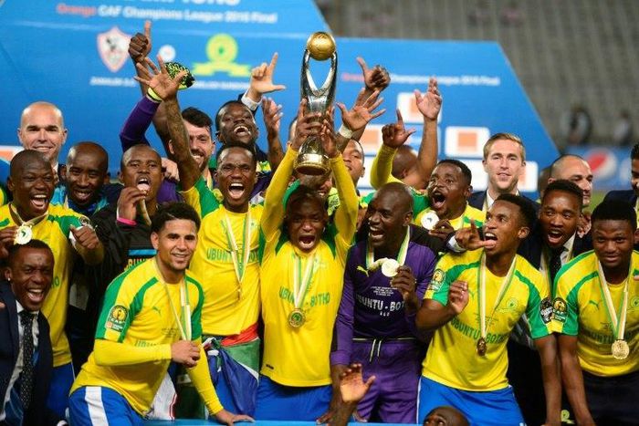 Mamelodi Sundowns' players celebrate after winning the CAF Champions League competition following their final match against Egypt's Zamalek, at the Borg el-Arab Stadium near Alexandria, on October 23, 2016