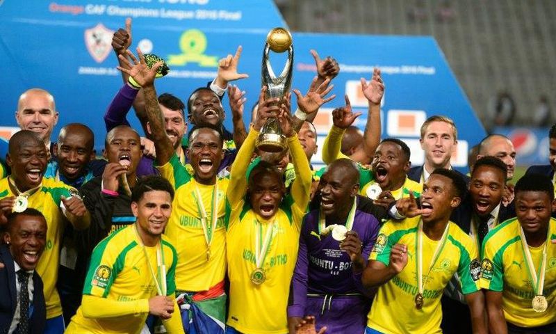 Mamelodi Sundowns' players celebrate after winning the CAF Champions League competition following their final match against Egypt's Zamalek, at the Borg el-Arab Stadium near Alexandria, on October 23, 2016