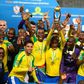 Mamelodi Sundowns' players celebrate after winning the CAF Champions League competition following their final match against Egypt's Zamalek, at the Borg el-Arab Stadium near Alexandria, on October 23, 2016