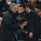 Manchester United's manager Jose Mourinho (L) shakes hands with Chelsea's head coach Antonio Conte after the final whistle at Stamford Bridge in London on October 23, 2016