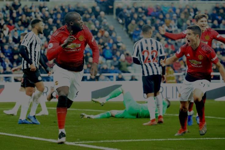 Manchester United forward Romelu Lukaku (left) celebrates his goal against Newcastle