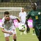 Tunisia's Youssef Msakni (L) fights for the ball with Senegal's Sadio Mane during their 2017 Africa Cup of Nations Group B match, in Franceville, on January 15, 2017